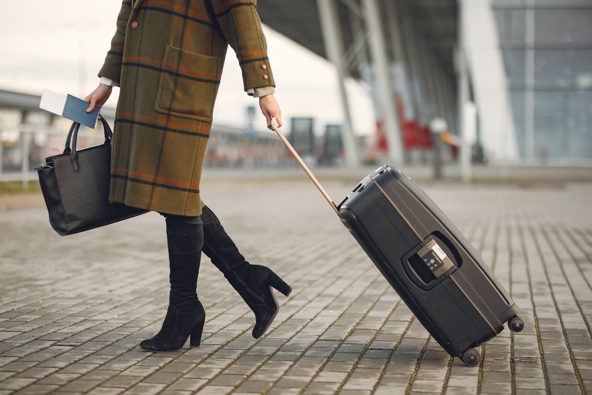 Woman with travel bag